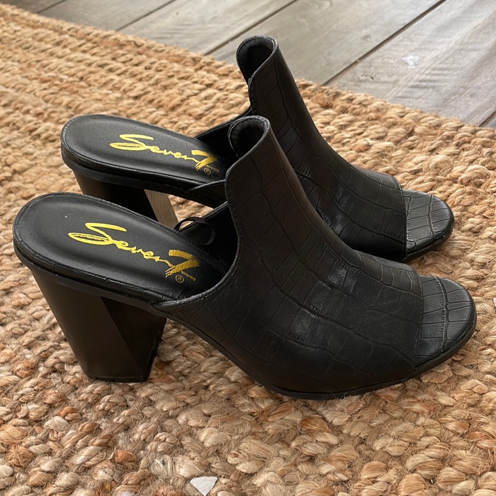 Black Leather Mules.